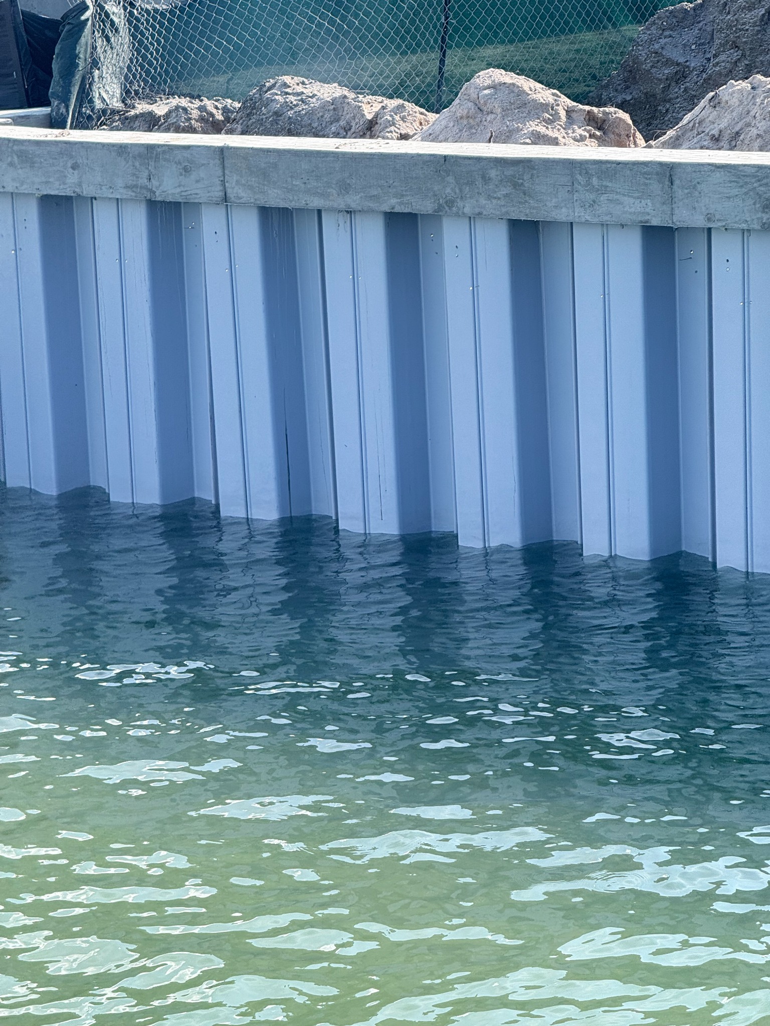 Coastal DCS vinyl seawall along the water's edge