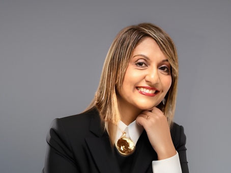 'Woman sitting quietly in reflection, rebuilding her identity after emotional trauma  --  Women Who Emerge, Atlanta GA