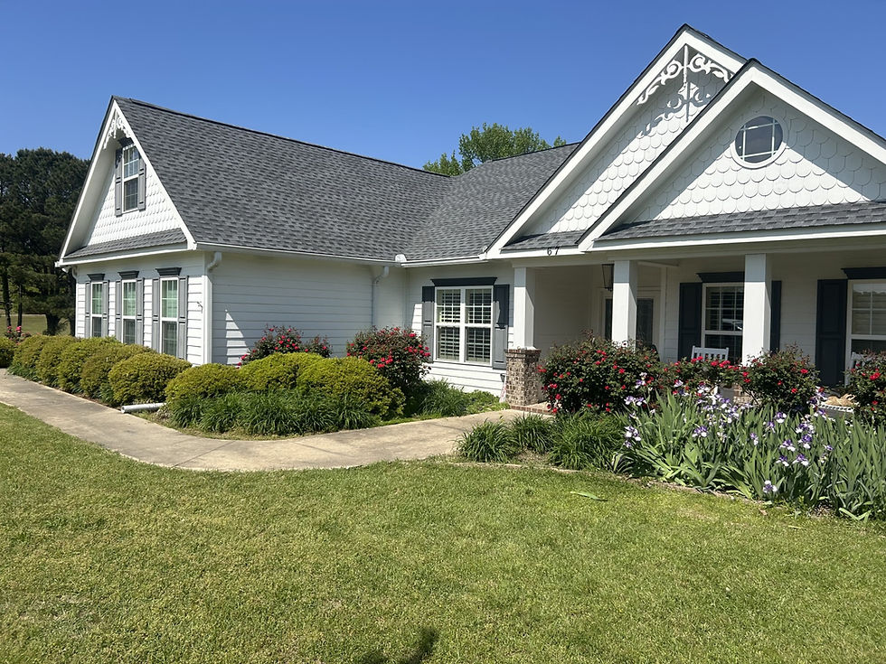 New architectural shingle roof on a two-story home in Mississippi