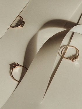 Cinematic still life of Bruce rings on neutral background
