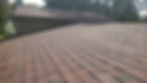 Eye-level view of a freshly repaired roof with matching shingles in Schaumburg IL