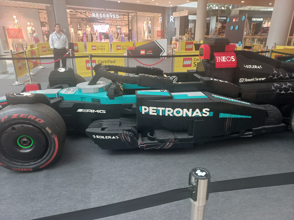 The LEGO Mercedes F1 car with a tyre's mark on its side from when the cars touched in Miami