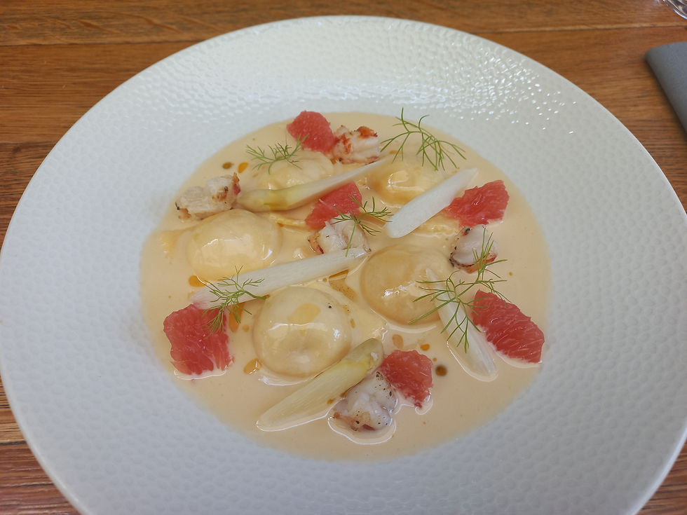 My dish, with ravioli, shrimp, asparagus and even grapefruit