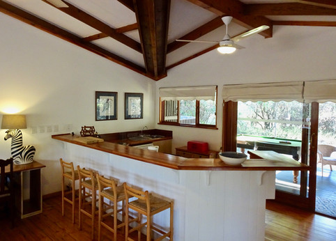 Kitchen bar at Imani with pool table