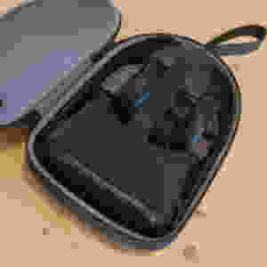 The Oculus Quest virtual reality headset and controllers in a carrying case.