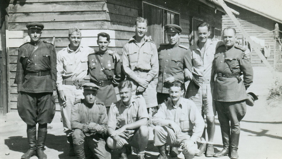 14 Ron Mill, centre back row with other Konan officers and Russian liberators. Approx 20 S
