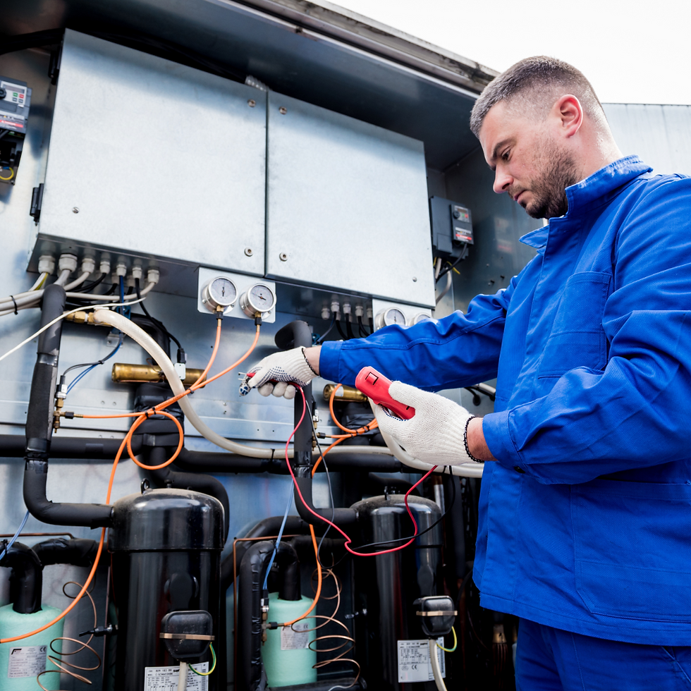HVAC technician testing electrical components on a commercial air conditioning system