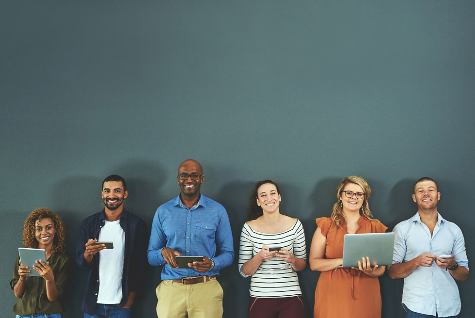 Diverse group of people standing in a row holding phones and tablets, symbolizing online community engagement and digital connection.