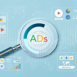 Digital advertising concept with magnifying glass highlighting the word 'Ads