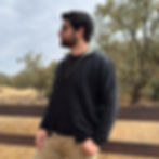 Koru Knitwear-New Zealand Knitted Zip Sweater with Pockets Black front on model