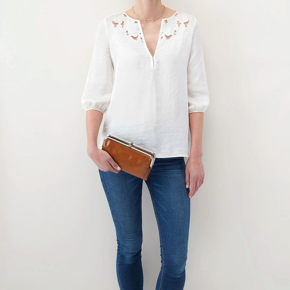 Thumbnail: Hobo Lauren Clutch Wallet Truffle front view on model