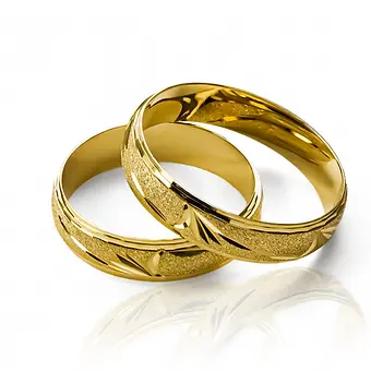 argollas de matrimonio de plumas, elaboradas en oro de 18k de la más alta calidad. En Joyería Caracas