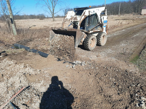 excavation, mini excavator, digging footers, trenching, downspout trenching, driveway pipe installation, shrub removal , drainage pipe installation