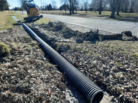 excavation, mini excavator, digging footers, trenching, downspout trenching, driveway pipe installation, shrub removal , drainage pipe installation