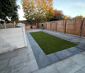 Twickenham paving project with a real grass area and small shed