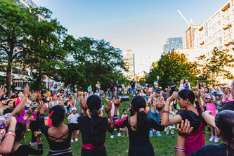 Community members of all ages join Nova Dance’s interactive performance at Jamii’s Joy in the Park in Toronto in David Crombie Park on The Esplanade in Toronto.