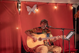 Musician Waleed Abdulhamid playing guitar during WAYO Children’s Festival 2026 in Toronto.
