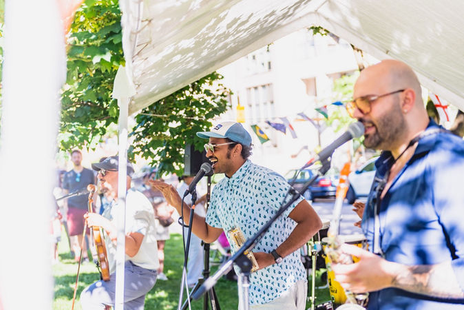 Ahmed Moneka sings with his Arabic Jazz band during Jamii’s Joy in the Park outdoor community arts event iin David Crombie Park on The Esplanade in Toronto.