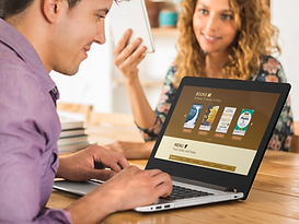asus-laptop-mockup-featuring-two-coworkers-at-the-office.png