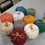 Thumbnail: DECORATIVE HANDMADE CROCHET PUMPKINS W/CINNAMON STICK STEM & JUTE BOW - 3 SIZES