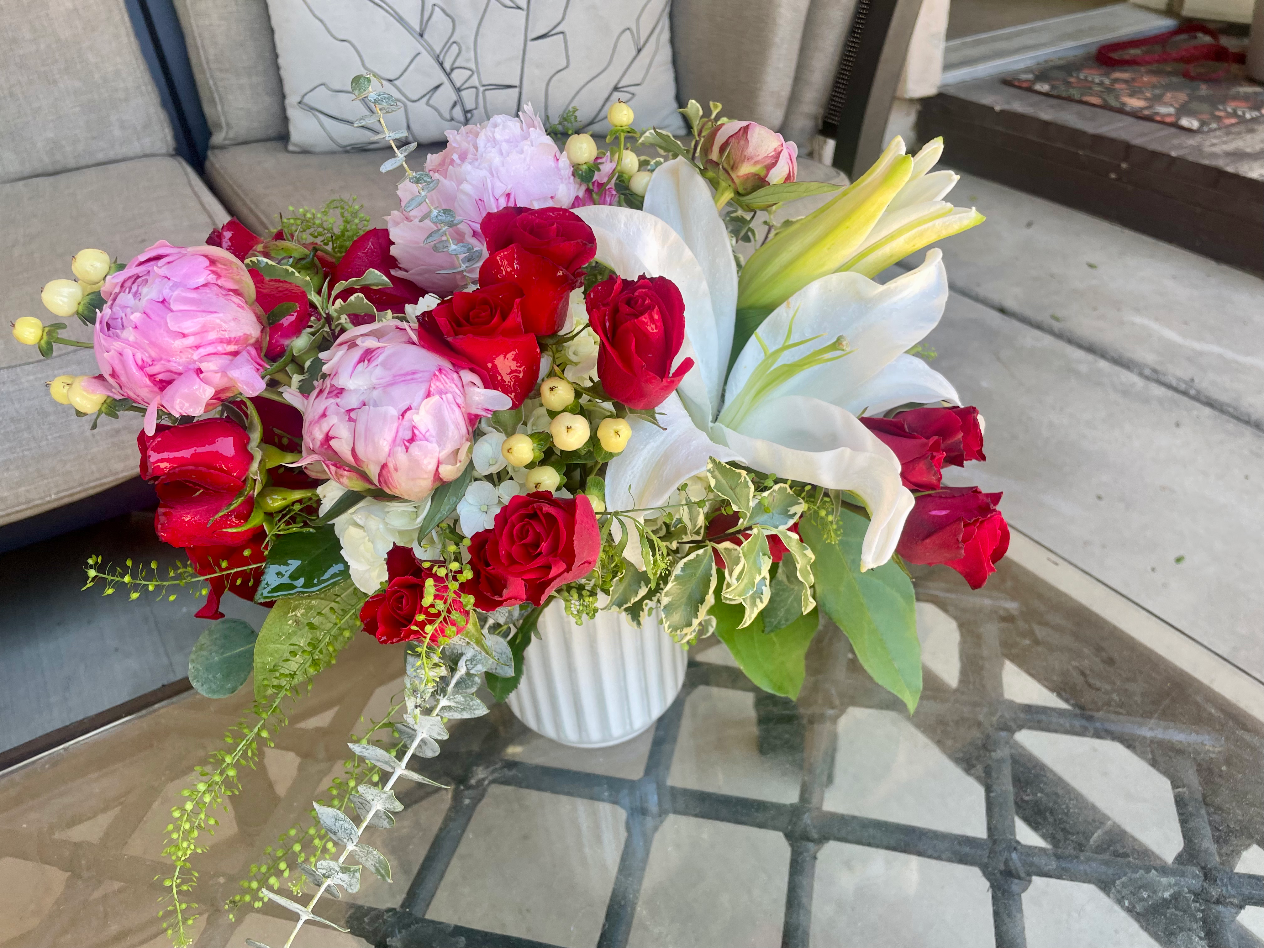 Red White and Pink floral arrangement by Joannie's Florals & Events in San Diego