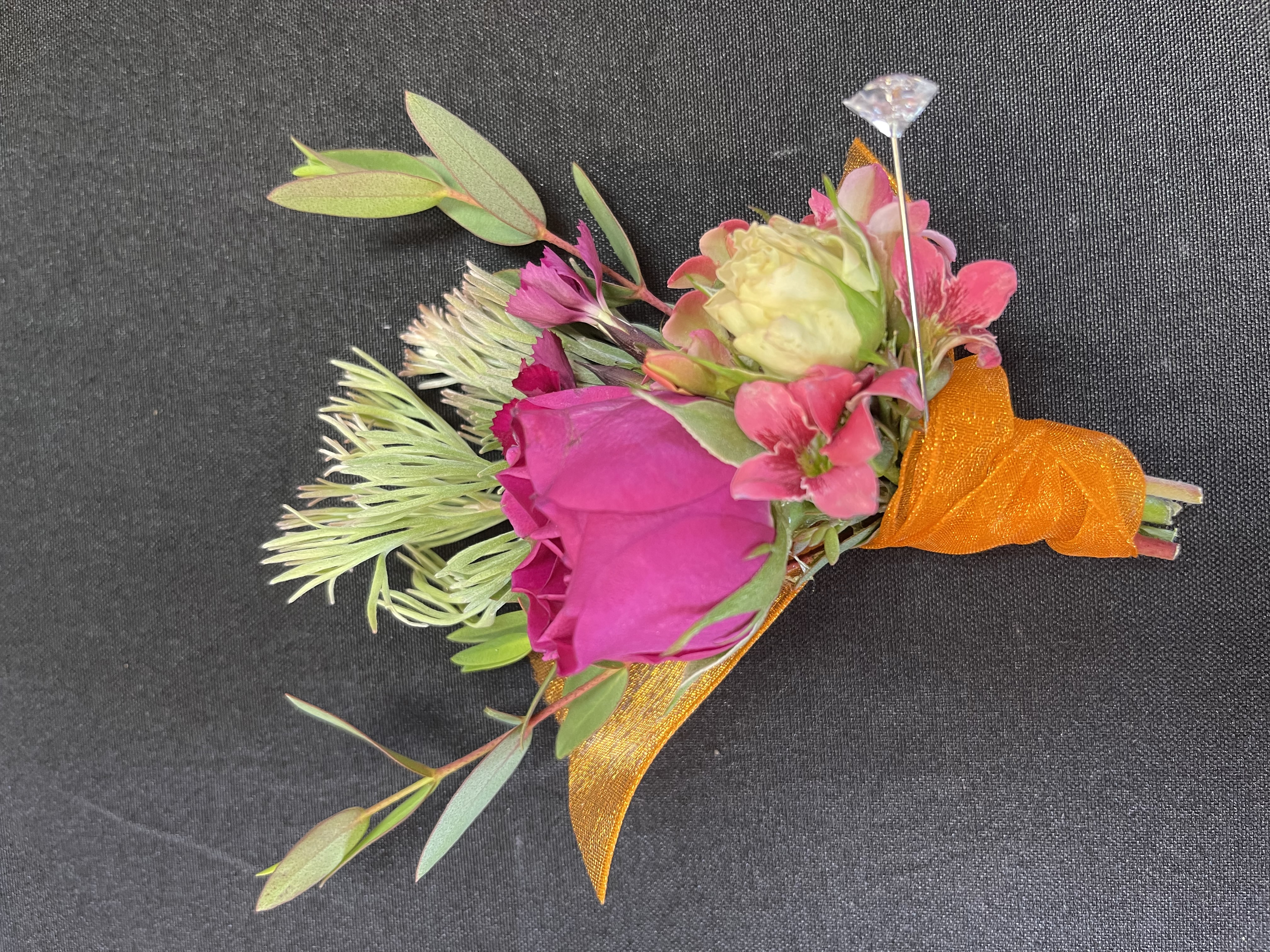Boutonniere floral arrangement by Joannie's Florals & Events in San Diego
