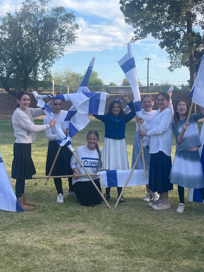 Girls celebrating with Israeli flags
