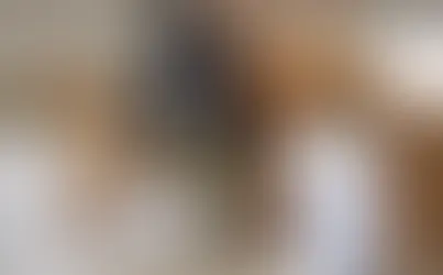 Niño de tres años en el área de cuidado personal de Montessori Learning Center El Paso, aprendiendo autonomía y control de esfínteres en 244 N Resler Dr.