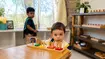 Toddler learning independently in an authentic Montessori classroom in El Paso