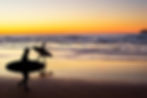 bigstock-Surfers-At-Sunset-Portugal-85511465