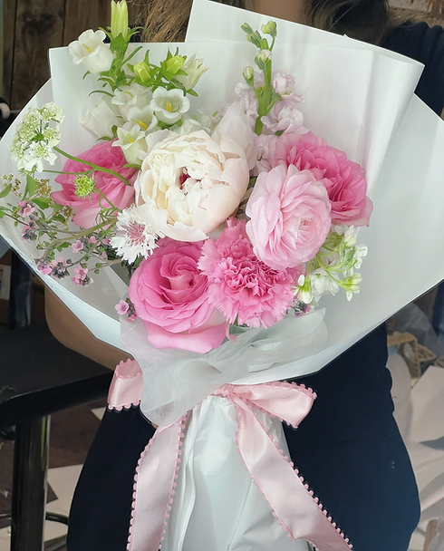 Fresh flower bouquet with mixed seasonal blooms from a local florist, available for same-day delivery