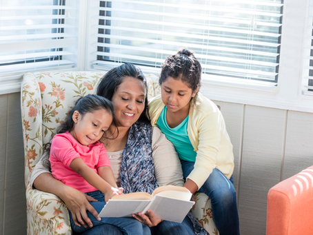 Family reading time, mother reads to children, early literacy, reading skills