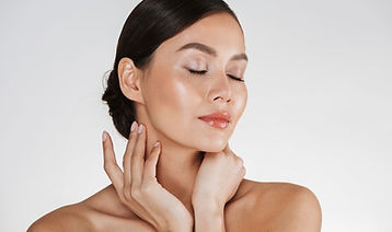 63c52f98ada9af2b82a9bea6_close-up-relaxed-brunette-woman-with-soft-skin-posing-camera-with