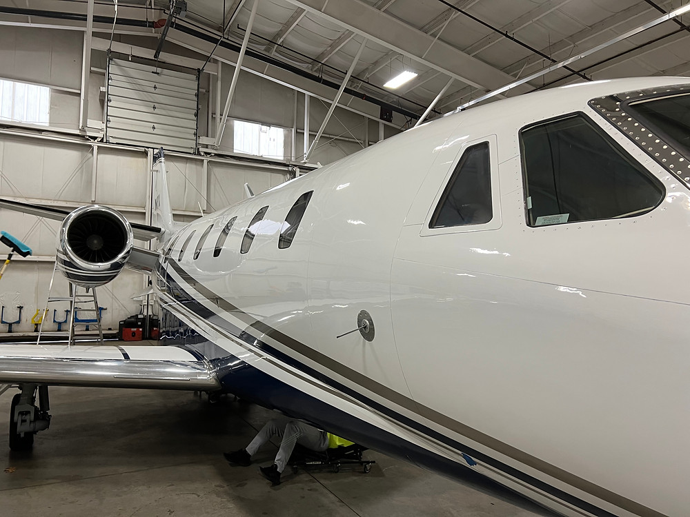 Close up side view of a CESSNA 560XL in a hanger