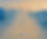 A sandy path with footprints leads into a misty horizon under a soft gradient sky of wheat and blue tones. Overlaid text reads, “Lord, you said that once I decided to follow you, you’d walk with me all the way…” A stylized “W” signature appears in the lower right corner, with the phrase “THIS IS MY TURNING POINT” centered at the bottom.