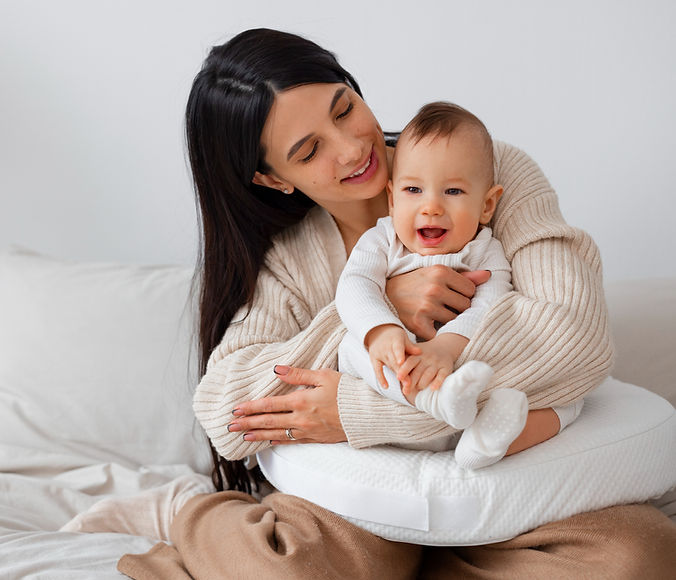 front-view-mother-holding-newborn-baby_edited.jpg