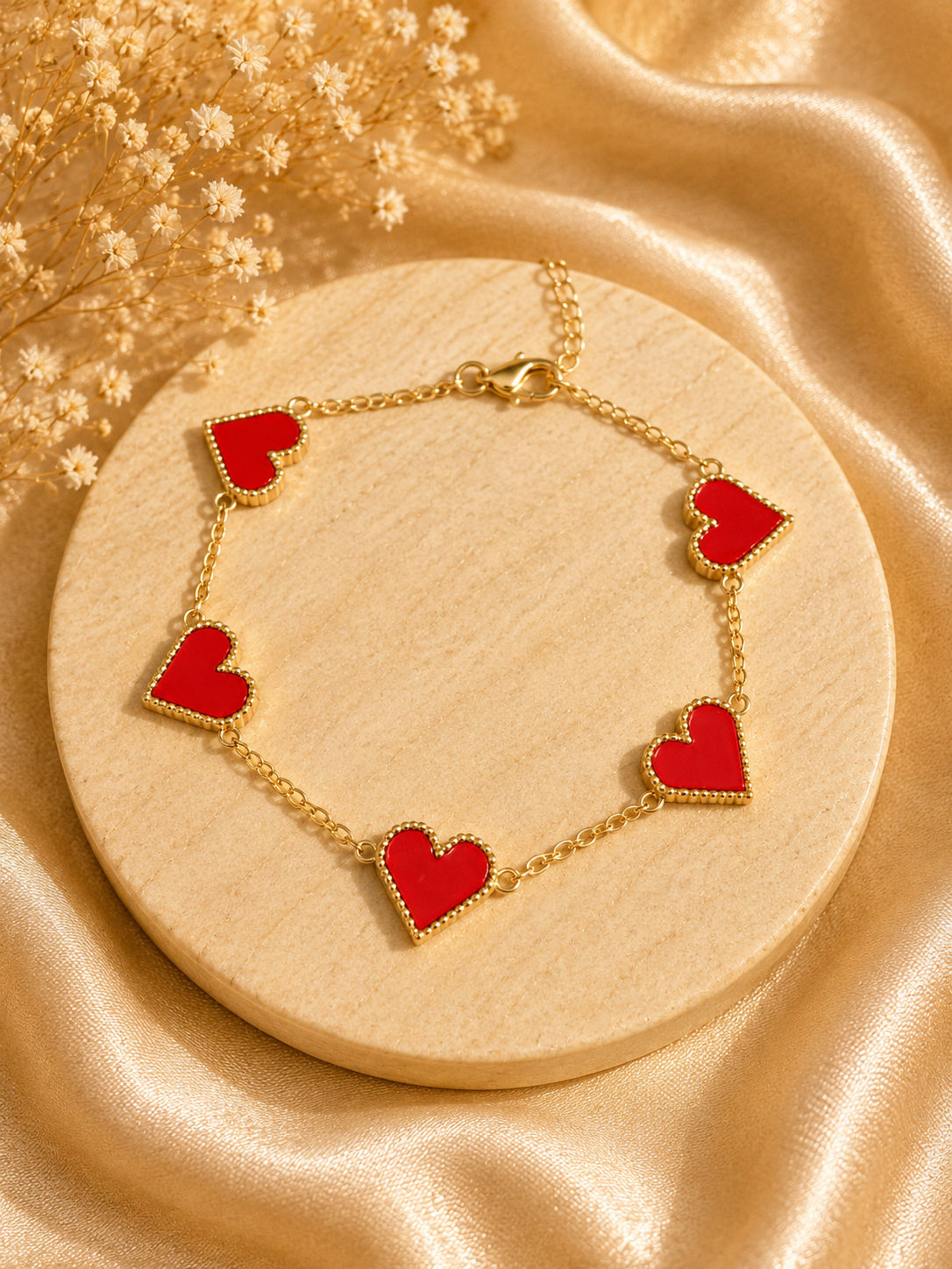 Pulsera de corazones rojos 