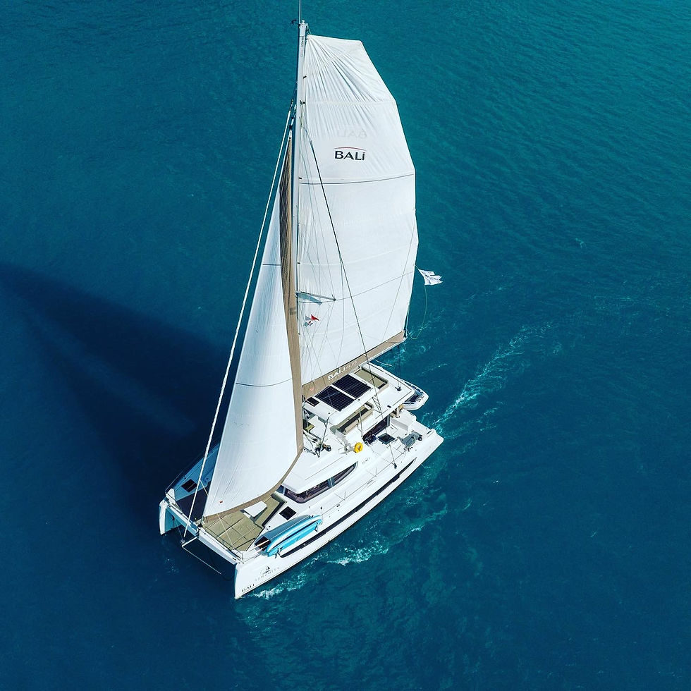 High angle view of a yacht in the water, highlighting its hull design