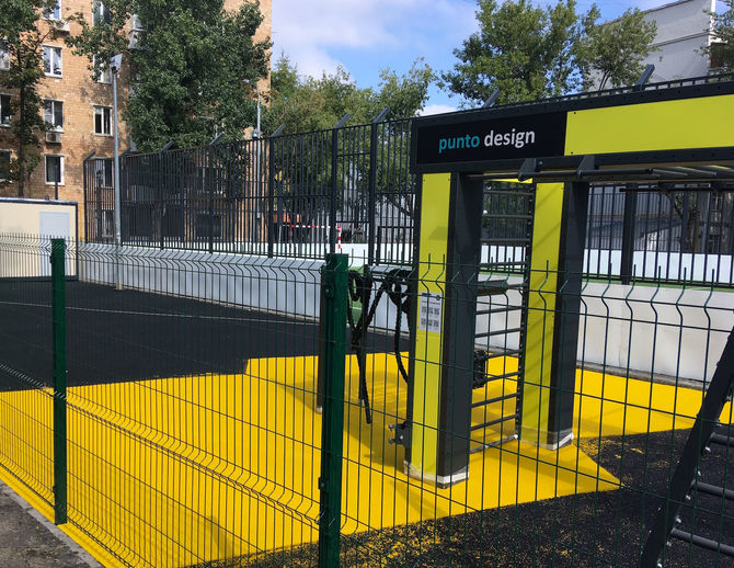 Монтаж покрытия на спортивной площадке Punto Design