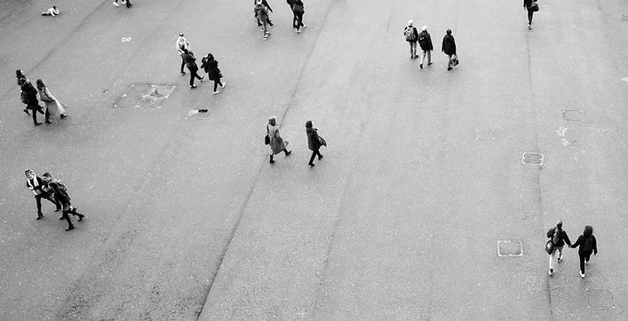 Urban setting people walking around