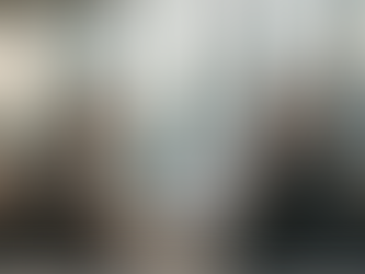 The image depicts a professional setting where an executive coach engages in one-on-one coaching with a client, fostering a human connection to explore personal growth and strategies for success. The scene emphasizes the contrast between a scarcity mindset and an abundance mindset, highlighting the positive aspects of coaching as a powerful tool for developing skills and solving problems in the business world.