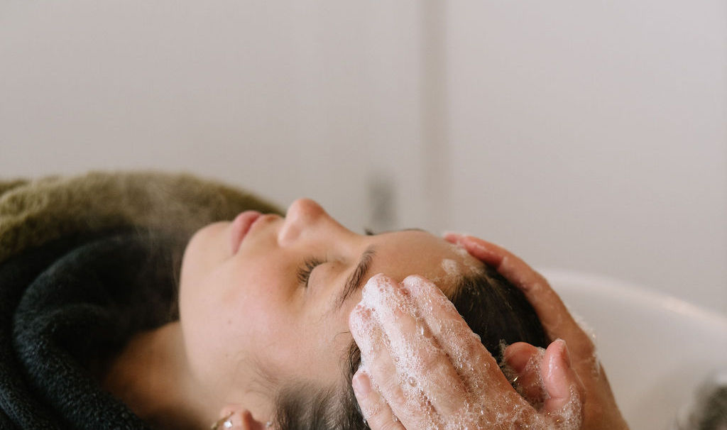 Scalp massage performed during a Japanese head spa treatment.