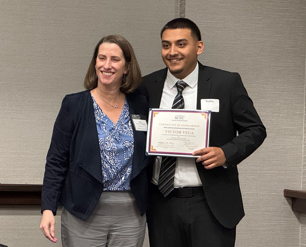 UOP alum Libby Schlegel with scholarship winner Victor Vega. 