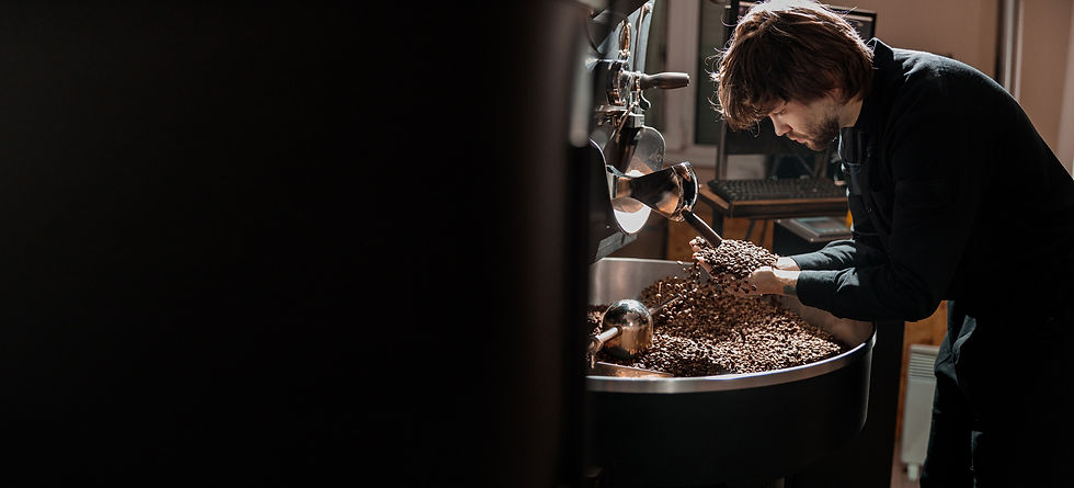 confident-coffee-roaster-man-is-checking-preparation-process-extend.jpg