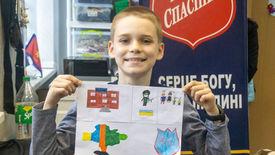 Ukrainian children draw their prayers