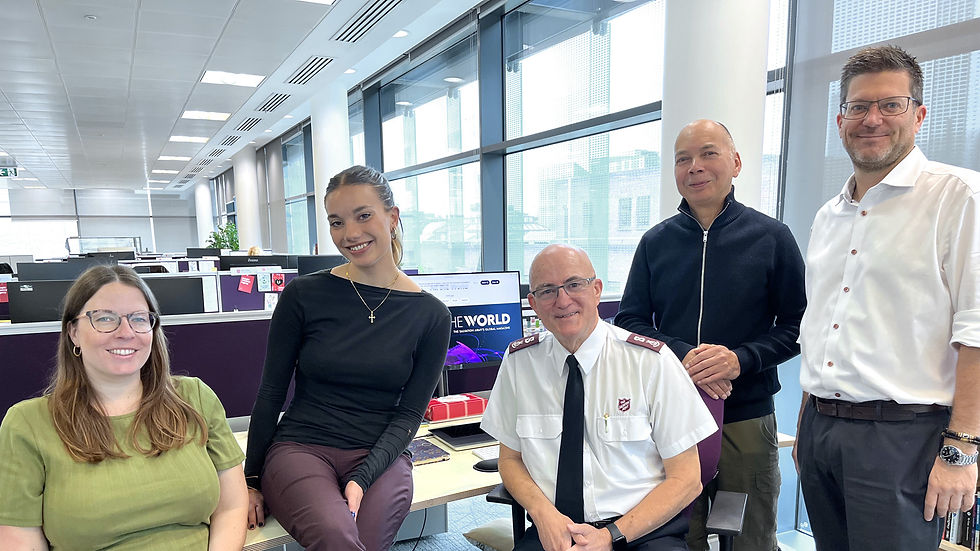 All the World team: Laura Booth (Editor), Marina Ley (Staff Writer), Major Peter McGuigan (Secretary for Communications), Berni Georges (Graphic Designer) and Joel Marks (Web Manager).