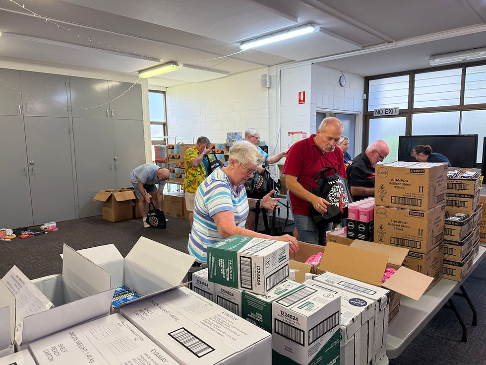 Volunteers putting some packages together for those impacted by the floods.