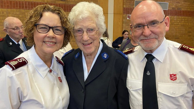 The international leaders with corps member Joan Papp, who is No.1 on the roll at Dunstable Corps.