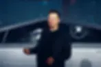 Elon Musk in front of Shattered glass of Cybertruck during demonstration