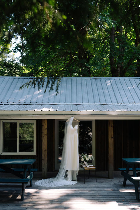 Kirsti & Chris's Wedding was glamours, chic, rustic, and surrounded by nature. The bride and groom wanted all the finer details set in mother nature's backyard. Natural looking white flowers, wood tables, stone charges, copper flatware,and burnt orange stemware was the perfect rustic chic decor. Starry string lights and rattan lanterns created a perfect glowing reception.
Welcome to Kirsti & Chris’s stunning collection of custom wedding day signage, where elegance meets nature in a beautifully curated selection. Their designs are modern, and sophisticated, perfectly suited to enhance the ambience of their special day. Their earthy contemporary table numbers beautifully complement their wedding decor, creating a cohesive and inviting atmosphere. The custom sepia place cards offered a personal touch, allowing the couple to include heartfelt notes for each guest, making them feel truly special. Elevate your wedding celebration with custom wedding signage that not only meets your needs but also reflects your unique style and vision for your unforgettable day.